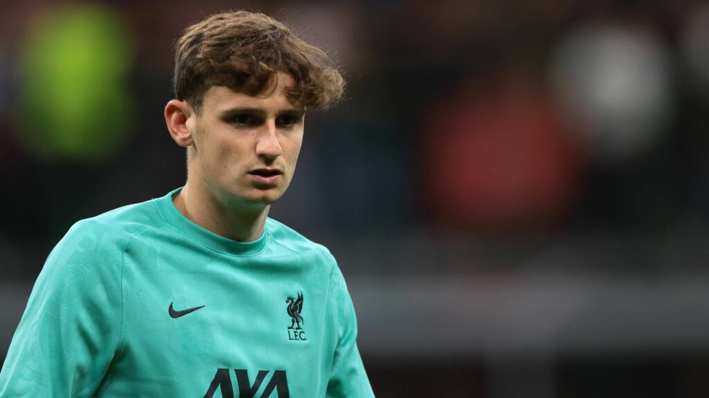 Tyler Morton warming up before a game for Liverpool