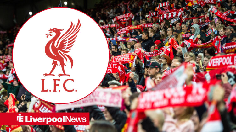 Liverpool fans holding up their scarves with Liverpool badge in the circular inset