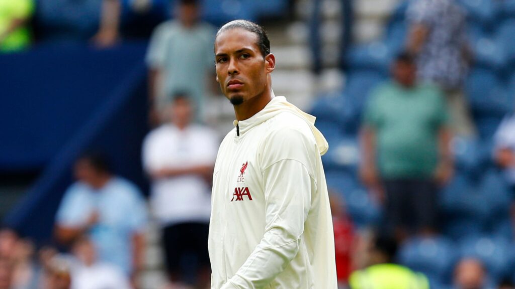 Virgil van Dijk walks out in his Liverpool attire