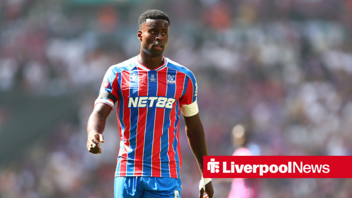 Marc Guehi plays for Crystal Palace in their home kit