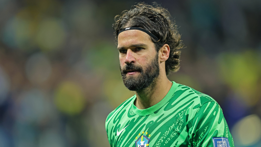 Liverpool goalkeeper Alisson in action for Brazil.