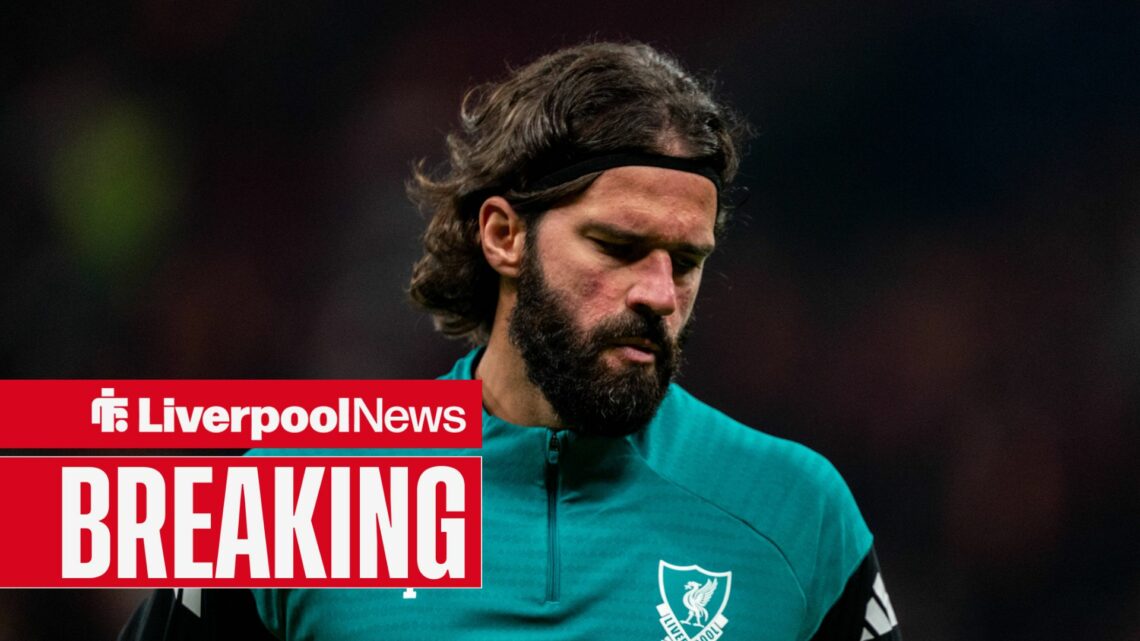 Liverpool goalkeeper Alisson looking upset.